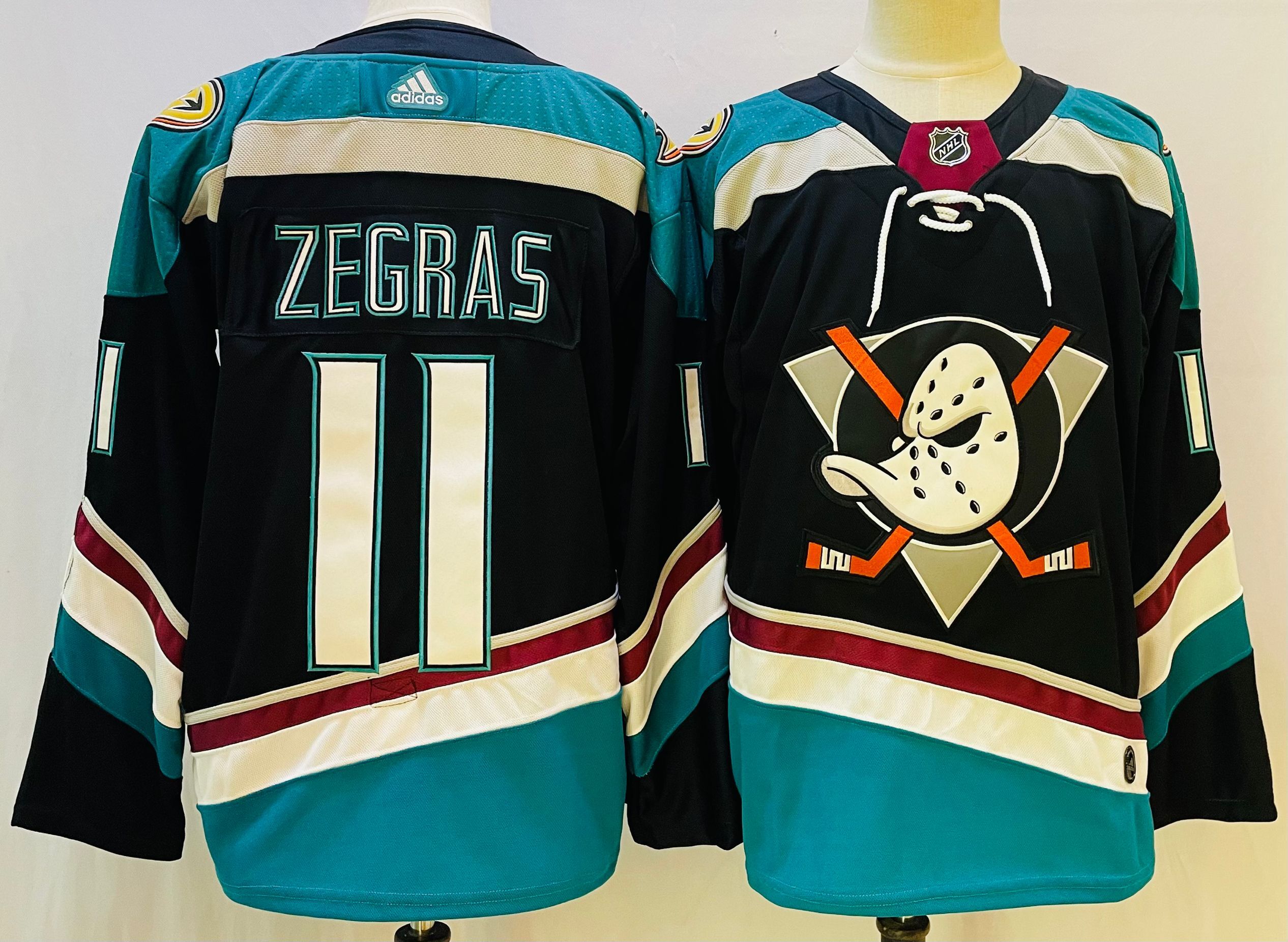 Men's Anaheim Ducks #11 Trevor Zegras Black Authentic Jersey - Click Image to Close