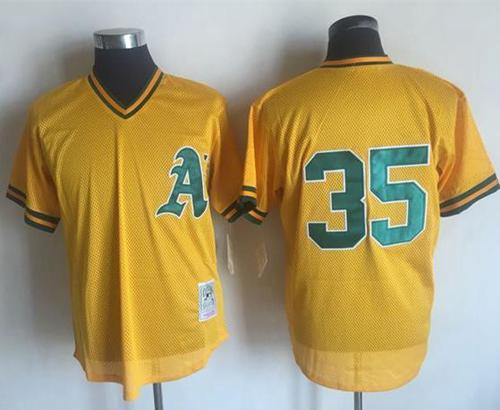 Mitchell And Ness 1984 Athletics #35 Rickey Henderson Yellow Throwback Stitched MLB Jersey